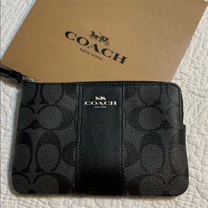 Coach signature wristlet.